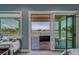 Main bedroom featuring water view from balcony at 15805 Redington Dr, Redington Beach, FL 33708