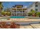 Gorgeous pool and hot tub overlooking the waterfront, with ample patio space for entertaining at 15805 Redington Dr, Redington Beach, FL 33708