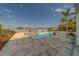 Beautiful waterfront pool and patio are perfect for enjoying the outdoors at 15805 Redington Dr, Redington Beach, FL 33708