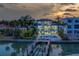 Elegant waterfront home with a beautiful pool, and private boat dock at 15805 Redington Dr, Redington Beach, FL 33708