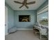 Cozy sitting area in the main bedroom with a vanity, providing a perfect spot for relaxation at 15805 Redington Dr, Redington Beach, FL 33708