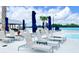 Lounge chairs by the community pool at 17012 Oval Rum Dr, Wimauma, FL 33598