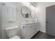 Contemporary bathroom with double vanity, sleek fixtures, and modern design at 1813 Hillside Dr, Tampa, FL 33610