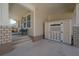 Convenient carport area with storage shed adjacent to a charming front porch at 1813 Hillside Dr, Tampa, FL 33610