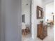 Bright dining nook features a round table, colorful rug, and access to the living area at 1813 Hillside Dr, Tampa, FL 33610