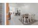 Bright dining room with hardwood floors, stylish furniture, and an inviting atmosphere at 1813 Hillside Dr, Tampa, FL 33610