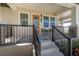 Cozy front porch with colorful rug, comfortable chairs, and a welcoming ambiance at 1813 Hillside Dr, Tampa, FL 33610