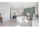 Bright kitchen with center island, stainless steel appliances, and an open concept design at 1813 Hillside Dr, Tampa, FL 33610