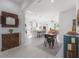 Bright living room with modern decor, open to kitchen and dining area, offering a spacious layout at 1813 Hillside Dr, Tampa, FL 33610