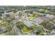 Aerial view of a peaceful neighborhood with tree-lined streets, well-maintained homes, and lush landscaping at 1932 Sean Wood Cir, Brandon, FL 33510