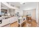 Bright kitchen featuring white cabinets, an island, modern appliances, and a breakfast nook at 1932 Sean Wood Cir, Brandon, FL 33510
