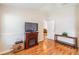 Comfortable living room featuring wood floors, fireplace, and a TV on display at 1932 Sean Wood Cir, Brandon, FL 33510