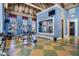 Well-equipped fitness center with weights, machines, mirrors, and ample space for a full body workout at 19608 Lonesome Pine Dr, Land O Lakes, FL 34638