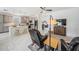 Open concept kitchen and living room area with large island and modern appliances at 19608 Lonesome Pine Dr, Land O Lakes, FL 34638