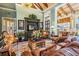 Resident lounge with comfortable seating, TV, decor and access to the building at 19608 Lonesome Pine Dr, Land O Lakes, FL 34638