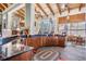 Lounge area with beautiful cabinetry, a countertop, and a kitchen, ideal for entertaining at 19608 Lonesome Pine Dr, Land O Lakes, FL 34638