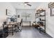 Home office space with modern desk setup, shelving, and neutral walls at 19608 Lonesome Pine Dr, Land O Lakes, FL 34638