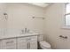 Clean bathroom featuring a white vanity, new fixtures, and plenty of natural light at 2146 Waterside Dr, Clearwater, FL 33764