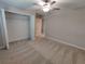 Bedroom with carpet and a closet for plenty of storage space at 23300 Willow Glen Way, Lutz, FL 33549