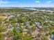 Aerial view of a suburban home with mature trees, showing the property's location in a residential area at 241 72Nd N St, St Petersburg, FL 33710