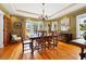 Elegant dining room featuring hardwood floors and decorative chandelier for a classic aesthetic at 241 72Nd N St, St Petersburg, FL 33710