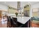 Stunning kitchen with a center island, stainless steel appliances, and tiled flooring at 241 72Nd N St, St Petersburg, FL 33710
