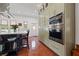 Bright kitchen with stainless steel appliances, custom cabinets, and terra cotta tile flooring at 241 72Nd N St, St Petersburg, FL 33710