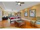 Spacious living room with hardwood floors, modern furniture, and recessed lighting at 241 72Nd N St, St Petersburg, FL 33710