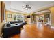 Expansive living room with hardwood floors, tray ceiling, and an open layout great for entertaining at 241 72Nd N St, St Petersburg, FL 33710