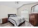 This bedroom offers wood floors, a ceiling fan and light walls at 2641 Big Pine Dr, Holiday, FL 34691