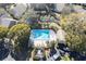 Aerial view exhibiting both the community pool and the property's location near the amenity at 2870 Rampart Cir, Clearwater, FL 33761