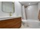 Elegant bathroom featuring modern vanity, sleek fixtures, and shower-tub combo at 2870 Rampart Cir, Clearwater, FL 33761