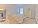Cozy bedroom features neutral carpet, natural light, and ample closet space at 3350 Stonebridge Trl, Valrico, FL 33596