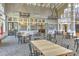 Bright dining room with large windows, comfortable seating, and stylish decor, perfect for gatherings and entertaining at 3350 Stonebridge Trl, Valrico, FL 33596