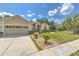 Charming one-story home with a well-manicured lawn and inviting two-car garage, perfect for Gathering living at 3350 Stonebridge Trl, Valrico, FL 33596