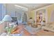 Spacious living room with hardwood floors and a seamless flow into the dining area and kitchen at 3350 Stonebridge Trl, Valrico, FL 33596