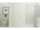 Clean bathroom with modern fixtures, toilet, and a shower enclosed with white tile at 3444 Lapis Lake Dr, Zephyrhills, FL 33541