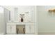 Elegant bathroom boasting double sinks, vanity area, and a refreshing shower space at 3444 Lapis Lake Dr, Zephyrhills, FL 33541