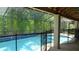 Sparkling screened-in pool area, enclosed with a safety fence at 3914 Roswell Pl, Land O Lakes, FL 34639