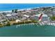 Beautiful waterfront condo building with private boat docks and beach access, showcasing the perfect coastal lifestyle at 399 2Nd St # 217, Indian Rocks Beach, FL 33785