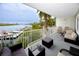 Spacious balcony with comfortable seating and beautiful water views at 399 2Nd St # 217, Indian Rocks Beach, FL 33785
