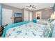 Cozy bedroom with two beds, a TV, and an en-suite bathroom for a relaxing stay at 399 2Nd St # 217, Indian Rocks Beach, FL 33785