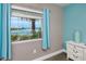 Bedroom window with view of water at 399 2Nd St # 217, Indian Rocks Beach, FL 33785