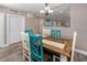 Colorful dining room with unique wood table at 399 2Nd St # 217, Indian Rocks Beach, FL 33785