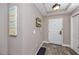 A beach-themed sign and key hooks grace the entryway at 399 2Nd St # 217, Indian Rocks Beach, FL 33785