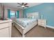 Charming main bedroom with a water view and beach-themed decor at 399 2Nd St # 217, Indian Rocks Beach, FL 33785