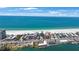 Waterfront condo's prime location, steps to beach, enhances its appeal for coastal living at 4103 Gulf Blvd # 107, St Pete Beach, FL 33706