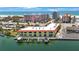 Waterfront condo building with private docks and balconies providing scenic Gulf of Mexico views at 4103 Gulf Blvd # 107, St Pete Beach, FL 33706