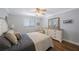 Cozy bedroom offers ceiling fan and a light and airy feel at 4103 Gulf Blvd # 107, St Pete Beach, FL 33706