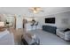 Open-concept living room features view to kitchen and dining area at 4103 Gulf Blvd # 107, St Pete Beach, FL 33706